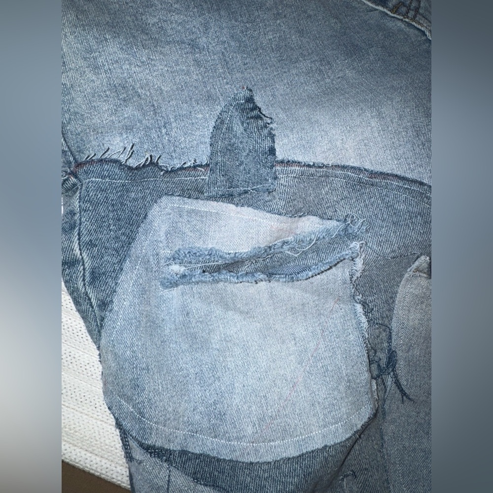 Custom Patchwork Light Wash Denim Jeans with Abstract Appliqué - Picture 6 of 7
